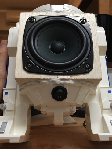 It is placed right under the speaker unit at the outside ...